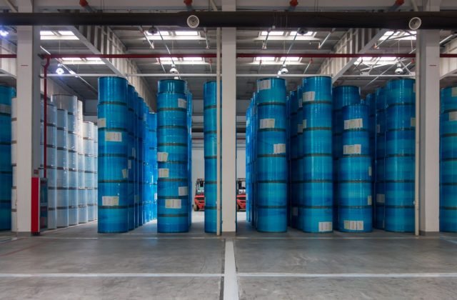 Many of Paper Rolls are Placed on the Floor in a Warehouse